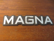 Original Magna car plastic badge / emblem - -----