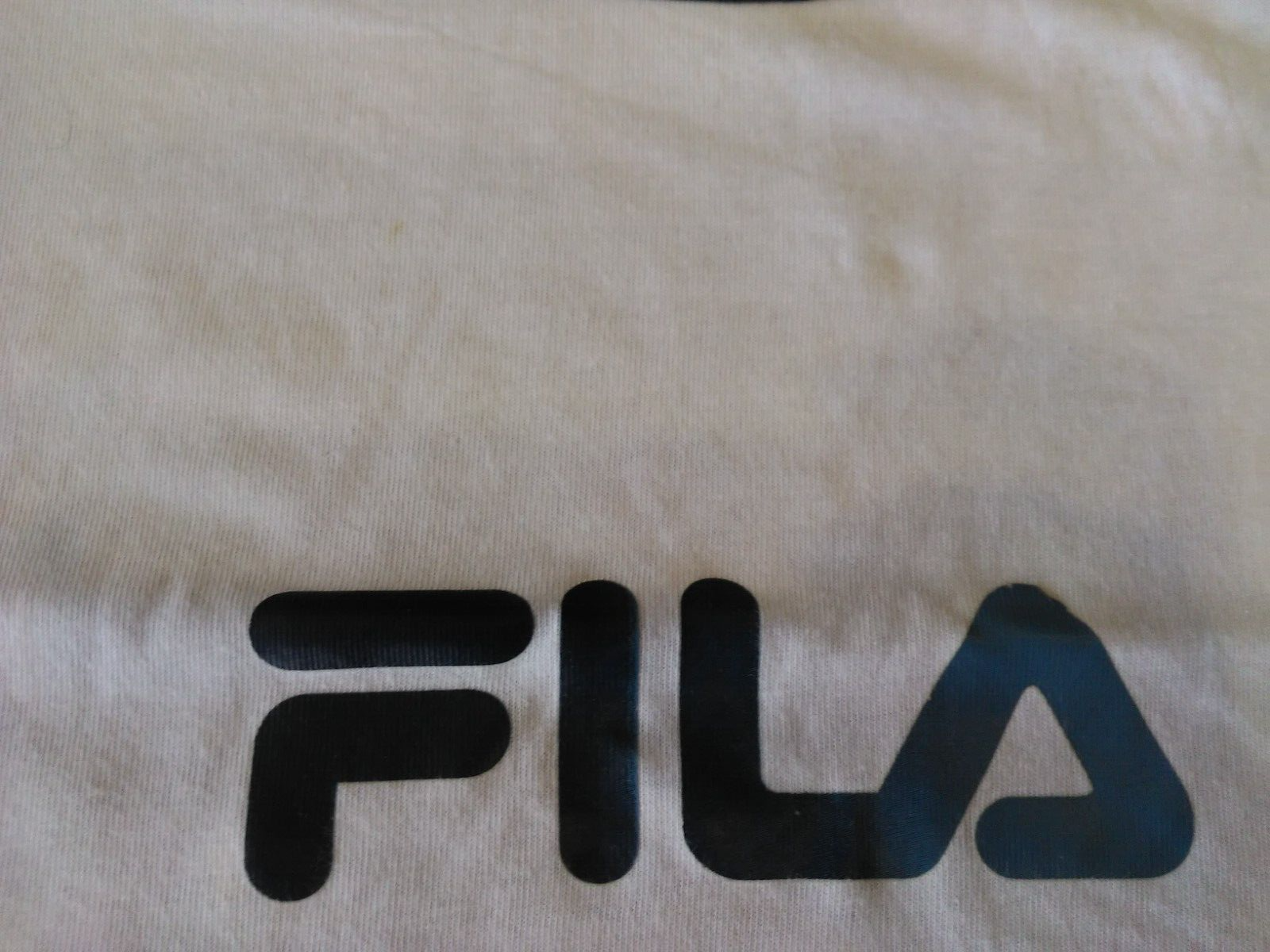 T shirt FILA (piccola macchia sulla scritta) Taglia M
