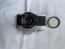 MINOLTA SRT200 FILM CAMERA WITH MC ROKKOR-PF 1:1.7 50mm LENS AND LENS FILTER
