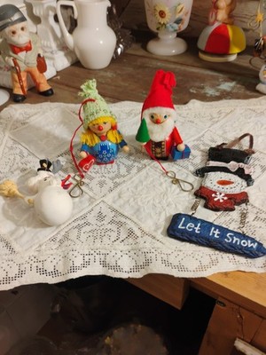 3-1950s Steinbach lumberjack signed,Santa,lady carrying love,and Santa an tree