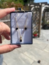 18ct gold sappire pendant with 18inch chain, earrings and ring to match 
