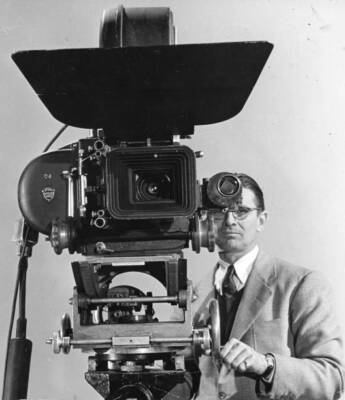 motion picture camera and its unidentified operator March 3 1945 Old Photo
