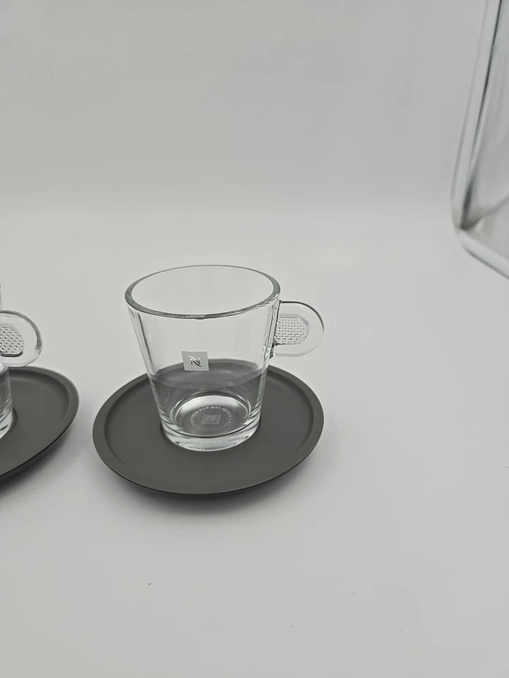 Juego de 2 tazas transparentes de café espresso Nespresso View Collection con platillos grises Foto 3 de 4