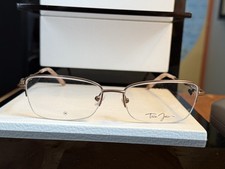 Tres Jolie by Marchon semi-rimless eyeglasses