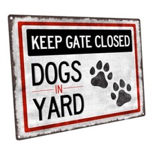 Dogs in Yard Metal Sign; Wall Decor for Porch, Patio, or Deck