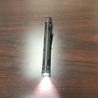 Coast HP3R LED Penlight Flashlight, Clip-On, Black/Red, rechargable — photo 3