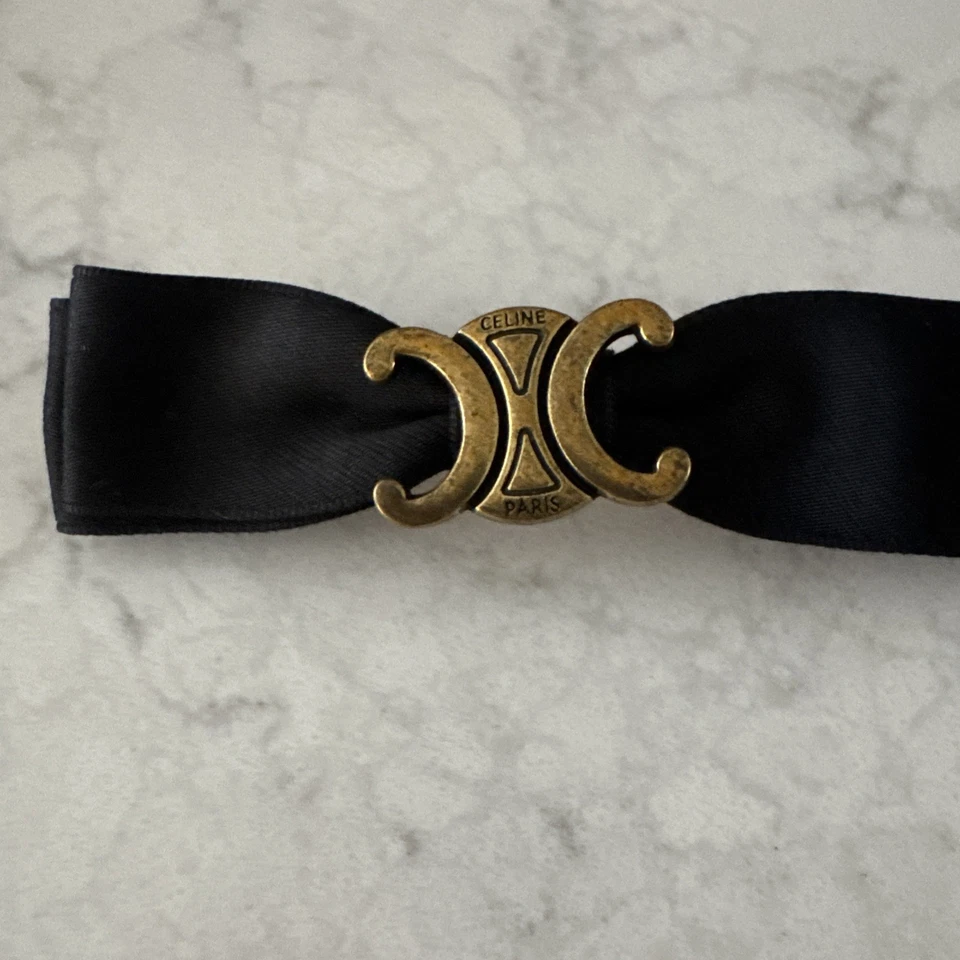 Clip de pelo Celine cinta negra/dorada Foto 2 de 3