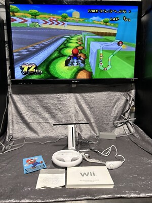 Nintendo Wii Game Console w/ Controllers, Cables And Wheel Tested