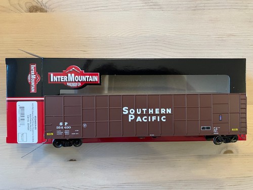 Góndola rotativa InterMountain HO 4524003 Southern Pacific Gunderson FMC con astillas de madera | Zustand: New