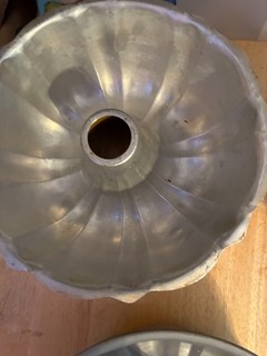 2 used bundt baking pans 10" X 5" Deep and 10" accross