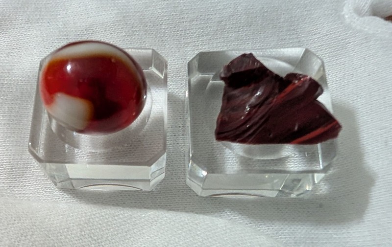 Oxblood Out Of Round Marble & Piece of Akro Agate Manufacturing Cullet & Odditiy