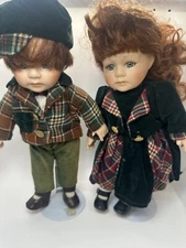 Leonardo Collection Couple Porcelain Dolls Vintage Dress Green Eyes Ginger Hair