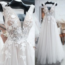Beach A Line Wedding Dresses with V Neck Lace Appliques Backless Bridal Gown