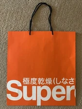 superdrystore orange paper large gift shopping bag approximately 19x18x6"