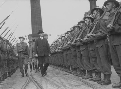 First Taoiseach of Republic of Ireland Eamon de Valera inspects a - Old Photo