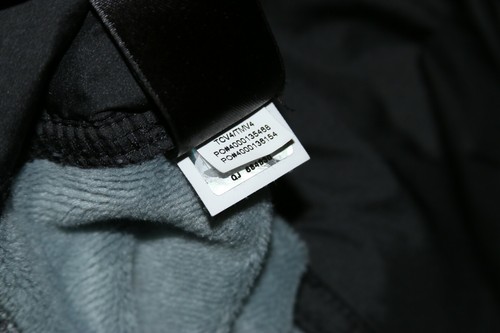 Chaqueta suéter con cremallera completa para mujer The North Face negra gris cortavientos frontal - Imagen 9 de 10
