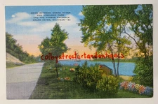 Drive Between GRAND HAVEN & HIGHLAND PARK Harbor Entrance Michigan vtg. postcard