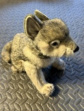 Hansa Wolf Cub Plush Sitting Portraits In Nature