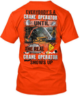Orange crane operator T-shirt with black “Everybodys A Crane Operator Until” text and visible crane in background.