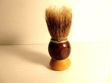 pre-owned shaving brush with 2 tone brown handle; some bristles missing