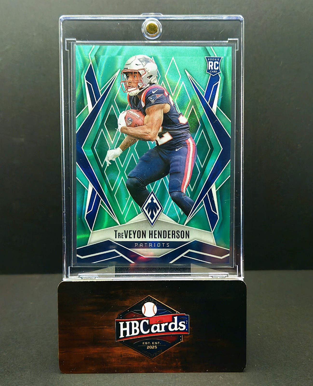 2025 Panini Phoenix - TreVeyon Henderson - #187 - Teal Lava /175 RC Patriots