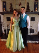 Light Green Prom Dress with Embellishments and Beaded Details