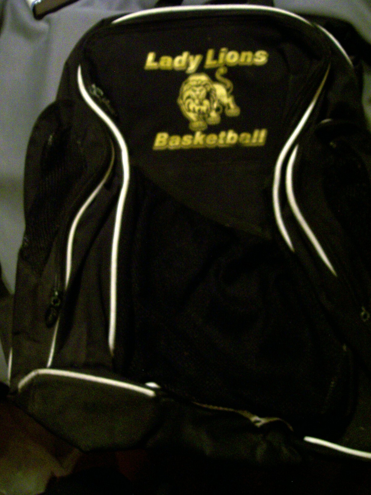 USED SPORT BACKPACK FROM A SCHOOL LADY LIONS BASKETBALL BLACK AND GOLD COLOR