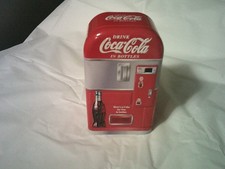 Boisson Coca Cola en bouteilles métal étain