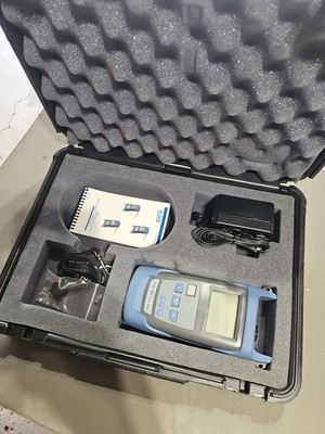 EXFO FPM-300 Fiber Optic Power Meter UNUSED with case and power adapter.