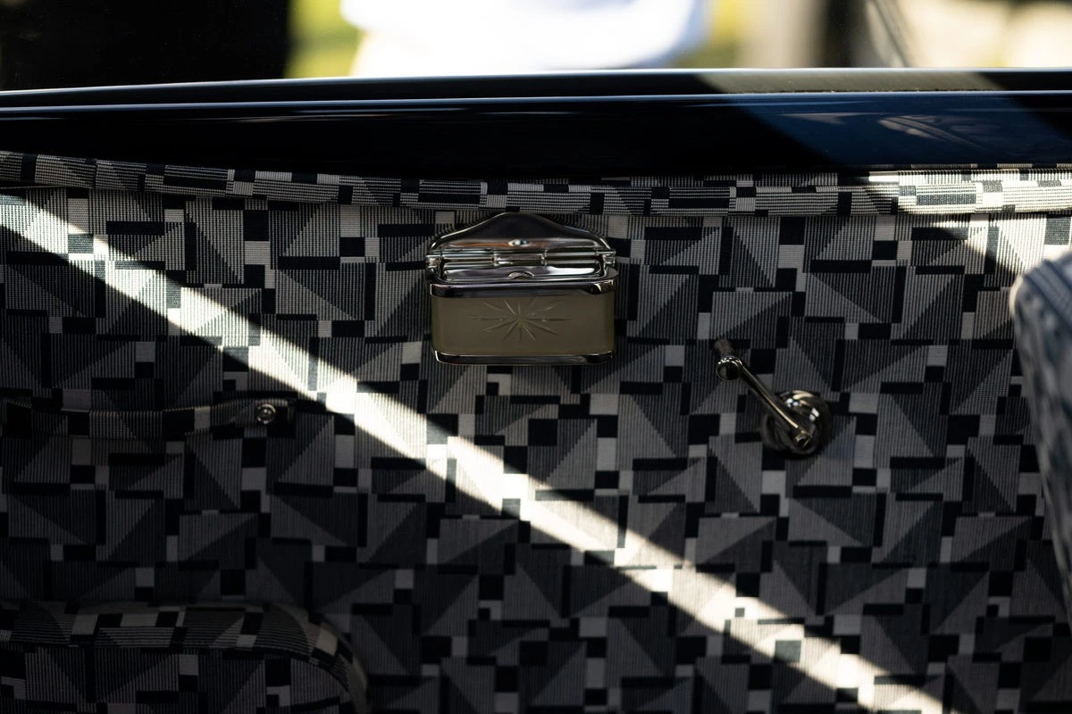 Distinctive upholstered door panel with ashtray