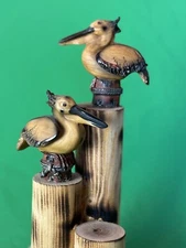 Pelicans on 3 dock posts vintage Resin