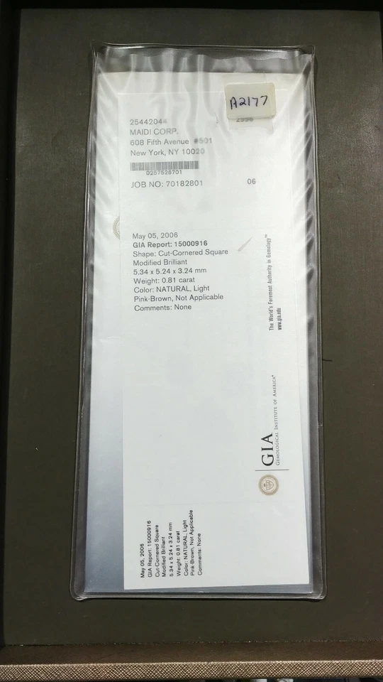 Anillo de compromiso estilo halo de platino de diamantes rosados 0,81 quilates diamante rosa GIA Foto 4 de 4