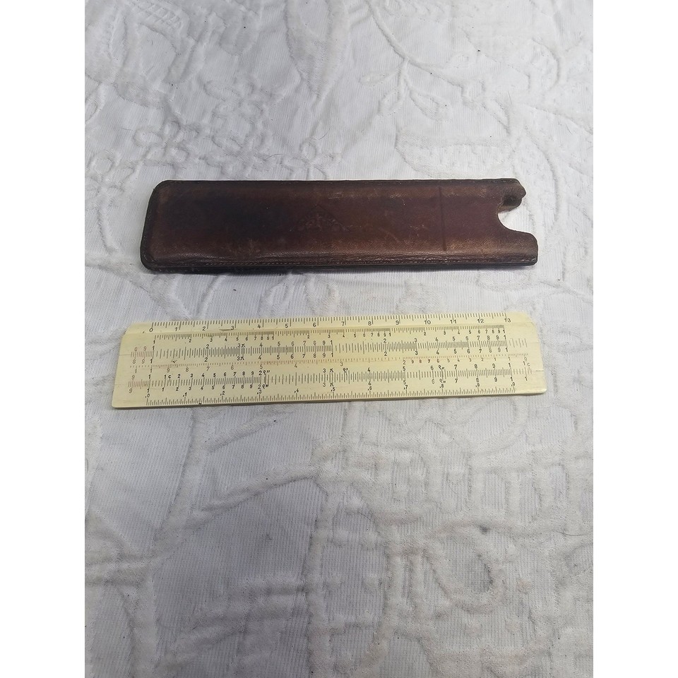 A German-made Albert Nestler wooden slide rule with its original leather case — Nestler were the European rivals to K&E, and the wood construction makes this a tactile, beautiful object.
