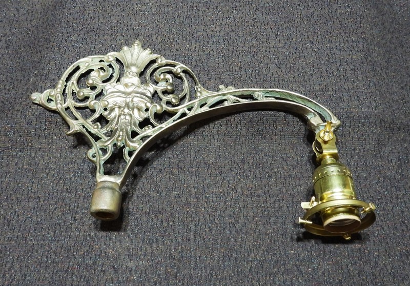 CAST BRASS BRIDGE ARM, WITH NORTH WIND DESIGN , # 7086