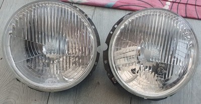 GOLF MK1 GOLF MK1 CABRIOLET PAIR OF HELLA HEADLIGHTS WITH BACKING PLATES