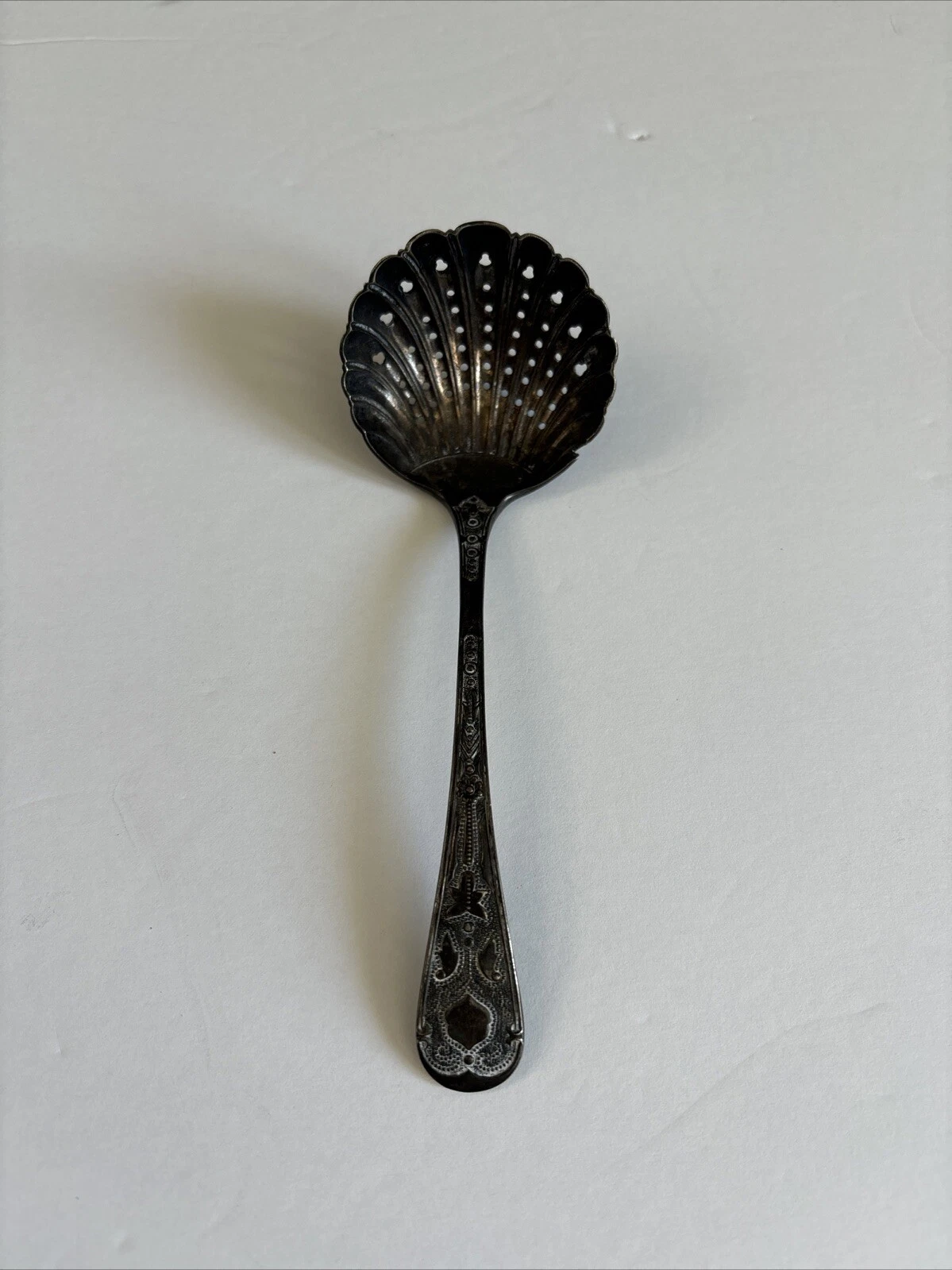 vintage ornate silver pierced shell confection berry ladle