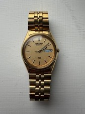 Vintage Seiko SQ Quartz 8123-8000 Gold Watch and original strap.
