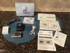 Canon PowerShot SD500 Digital Elph 7.1 MP Camera New Battery w/ Case Plus