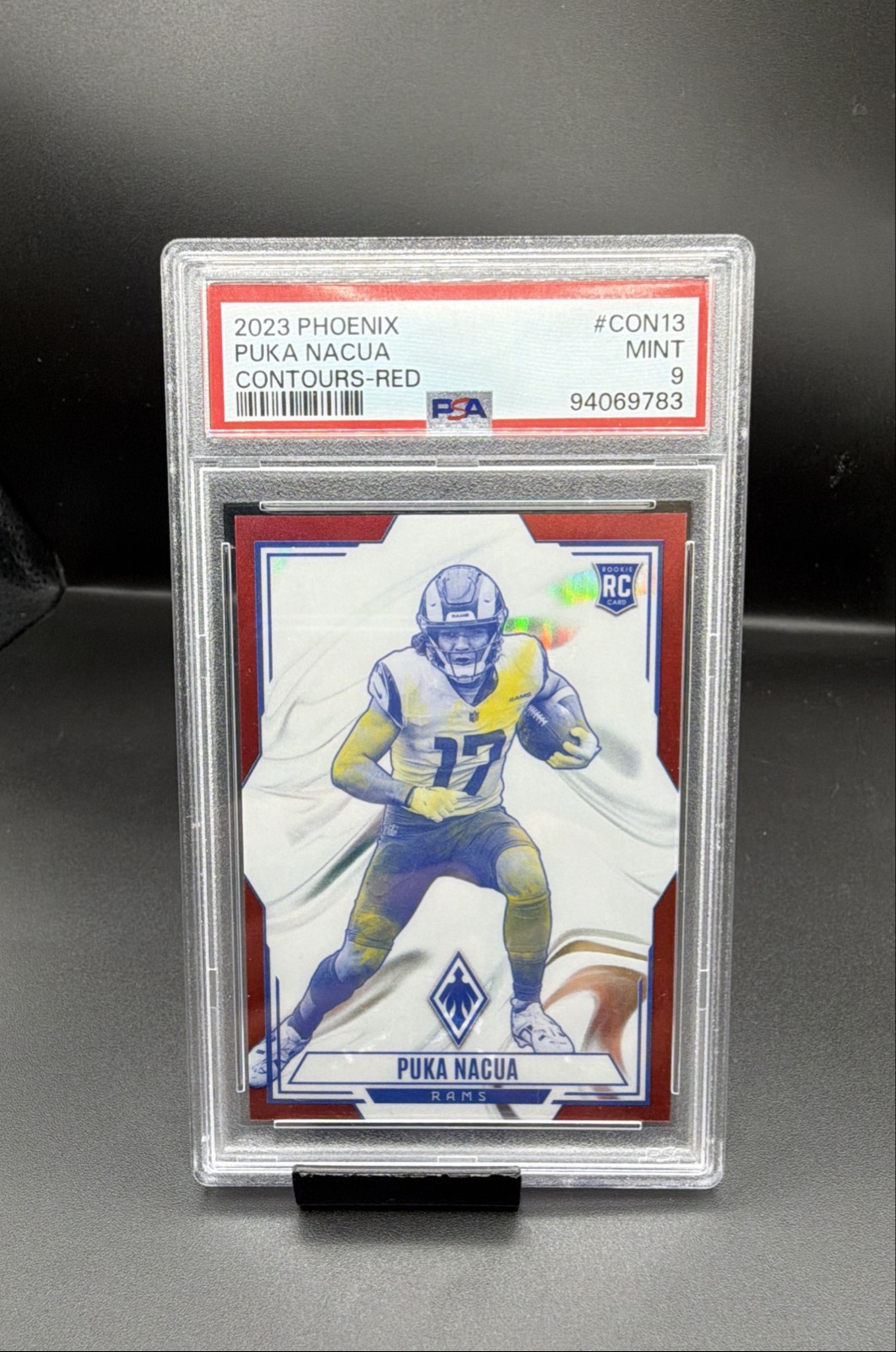 2023 Panini Phoenix - Contours Puka Nacua #CON-13 Red /199 (RC)