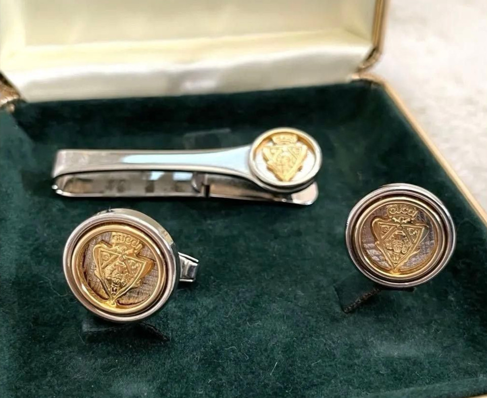 A rare vintage Gucci crest cufflink and tie clip set in gold and silver — genuine old-school Italian luxury with the kind of provenance that makes modern fast fashion look embarrassing.