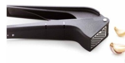 NEW TUPPERWARE GARLIC PRESS-IN BLACK COLOR