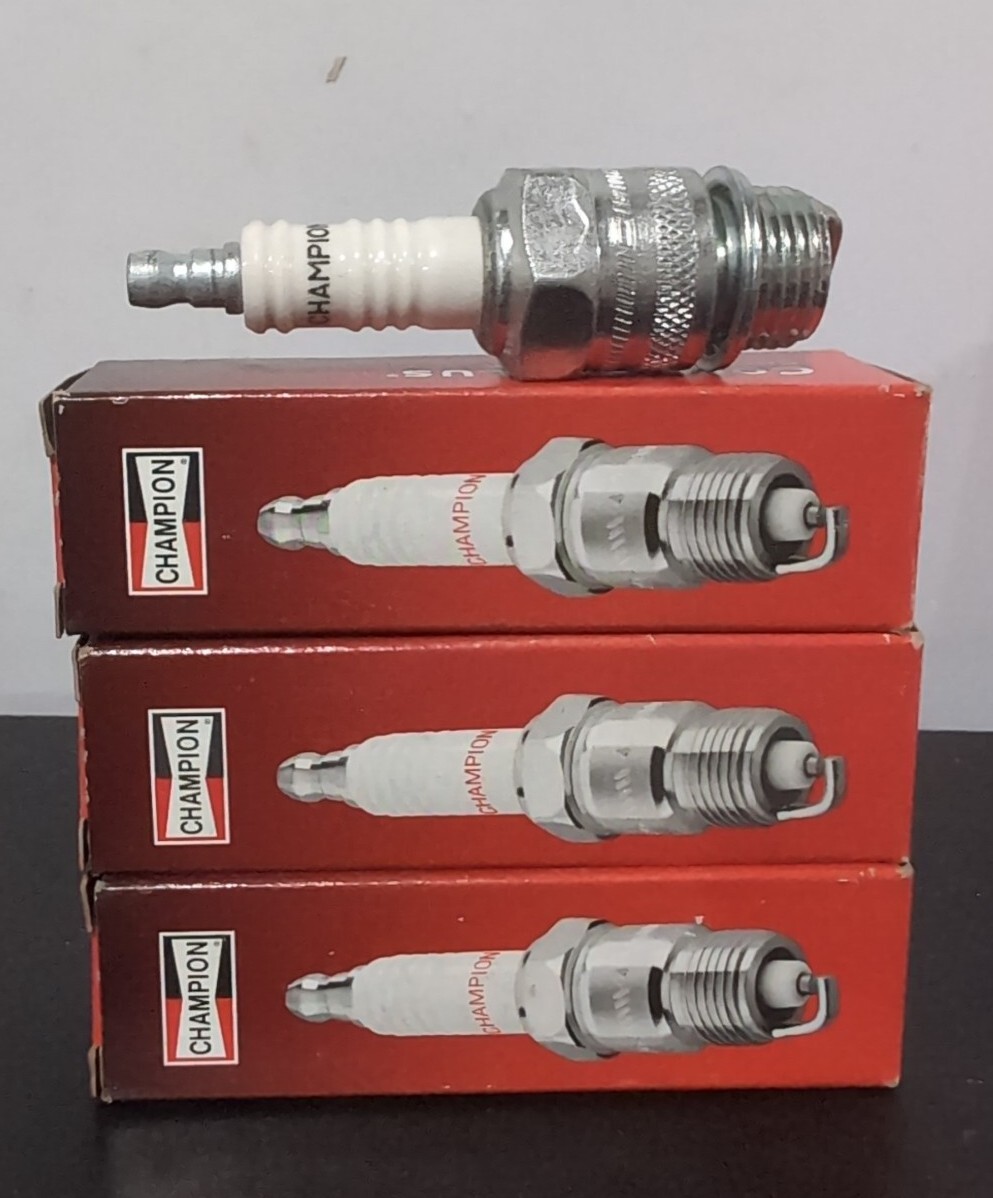 Qty 3 - New Champion Spark Plugs 502