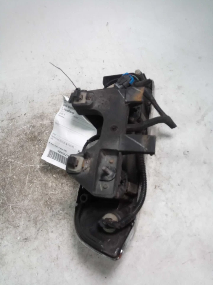 Chevrolet S10/S15 Sonoma 2003 conjunto de faros izquierdos azul 439880 usado Foto 2 de 4