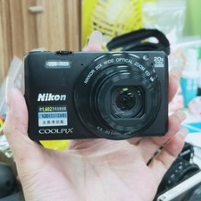 Nikon COOLPIX S7000 16.0 MP Vintage Digital Camera 20x Zoom English Black