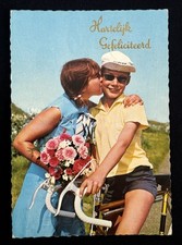 Dutch Woman couple Kiss Netherlands Vintage Continental Postcard Flowers Bicycle