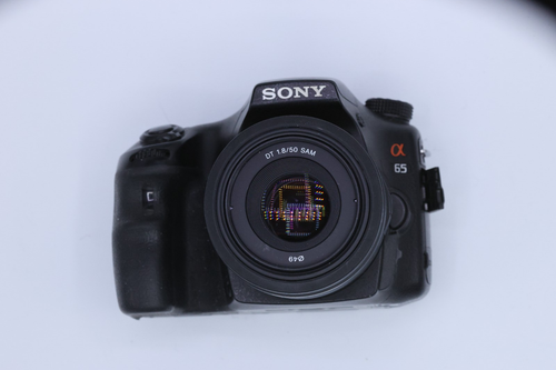 Sony Alpha a65 - 24.3MP Digital SLR Camera w/50mm lens; great working condition
