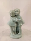 VINTAGE 1950'S BLUE SHAWNEE POTTERY BOY & GIRL HUGGING PLANTER VASE