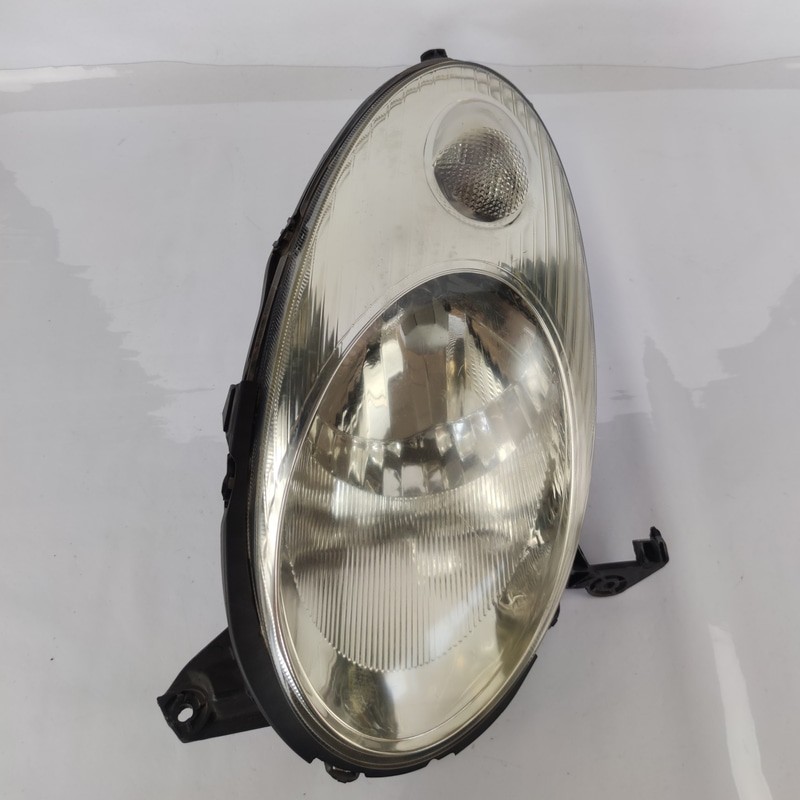 26060AX700 Proiettore SX NISSAN MICRA (K12E) 1.2 16V (59Kw) Ber. 3p/b/1240cc