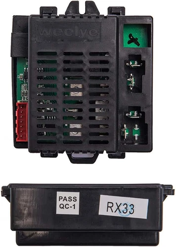 Black Weelye RX33 12V receiver box with exposed circuit board, connectors, and “PASS Q-1” label on top.