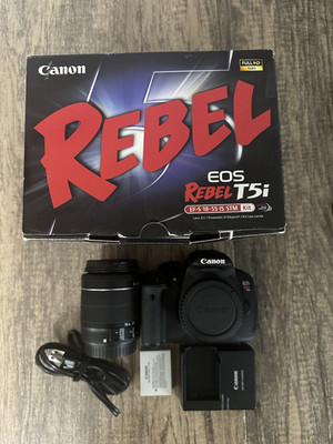 Canon EOS Rebel T5i dslr camera with EFS 18-55mm lens, battery and charger